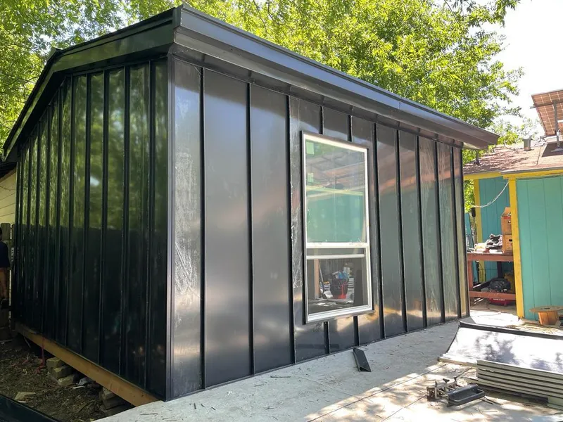 Black standing seam metal wall panels for Metal Roof Installation in Lake Holiday